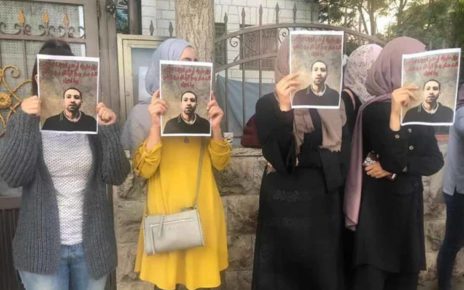 Protesters outside ICRC headquarters in Al-Bireh.